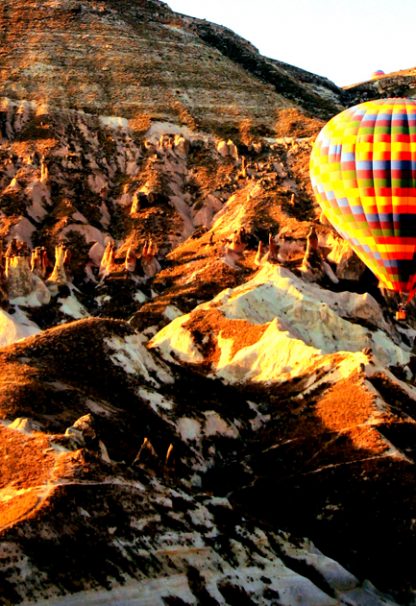 Hot air balloon and rock formation poster