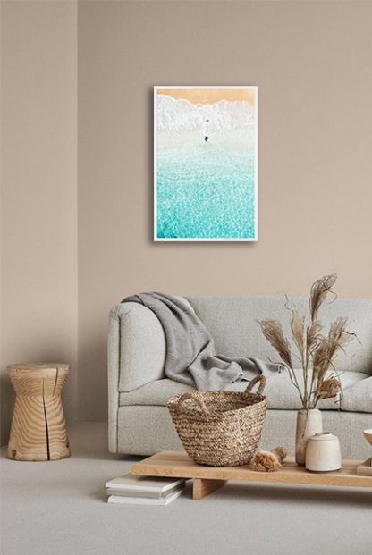 Bird flying on shore Poster