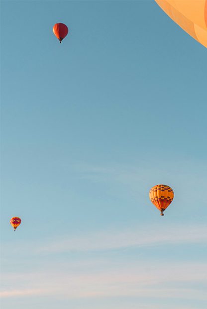 Blue sky and hot air balloon Poster