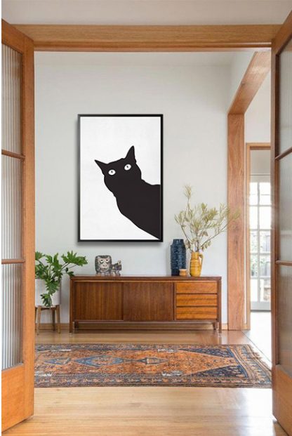 Black stencil cat poster in interior