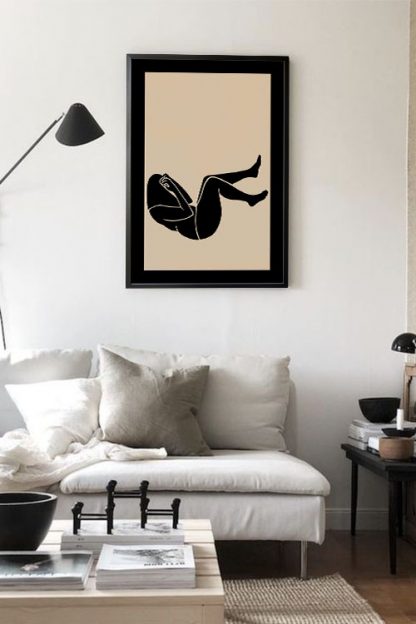 Chubby sad lady in black border poster in interior