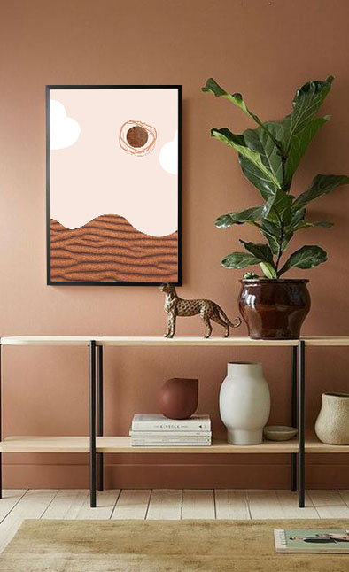 Graphical desert scenery poster in interior