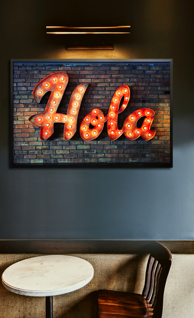 Neon hola sign poster in interior