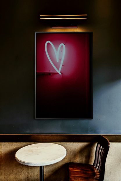 Neon pink hearth poster in interior