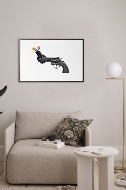 Non violence gun sculpture with flower poster in interior