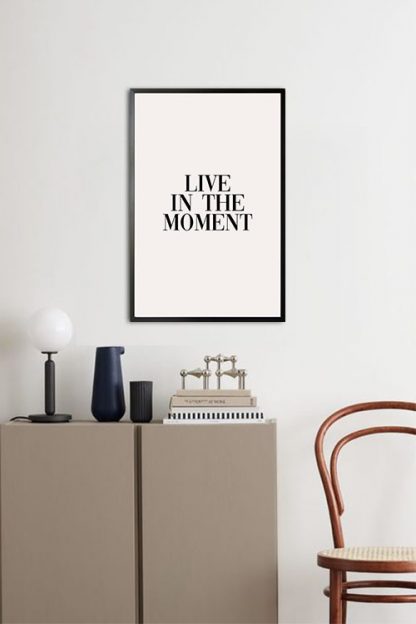 Live in the moment poster in interior