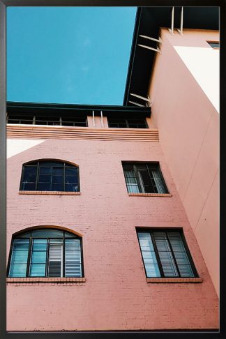 Worms eye view of house poster in a black frame