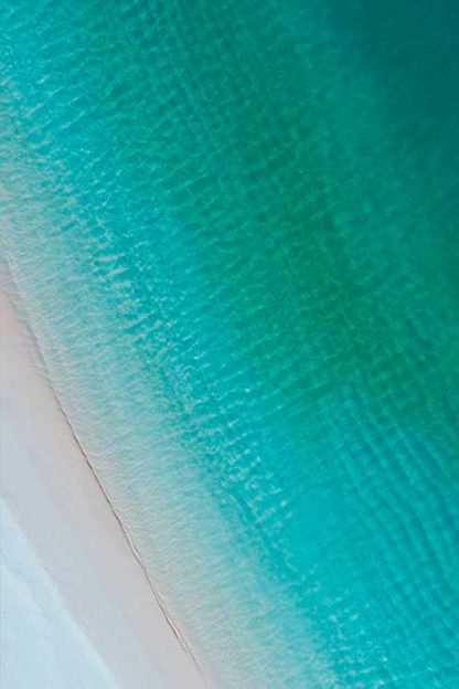 Vibrant water on beach poster