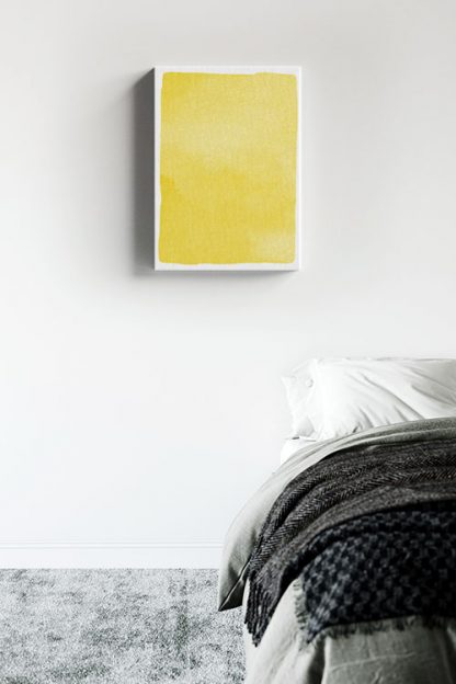 Textured yellow watercolor canvas in interior