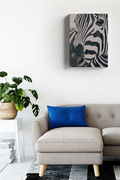Zebra in gray tone canvas hanged on a living room wall