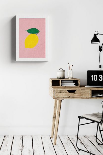 Lemon on pink background canvas in interior