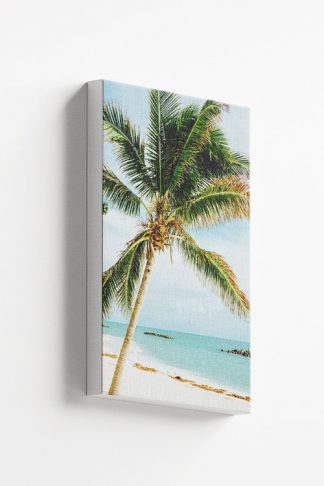 Beautiful beach with huge palm tree canvas