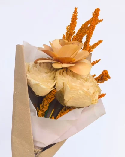 A flower bouquet with 2 fossilized stem white rose and 1 wooden flower.