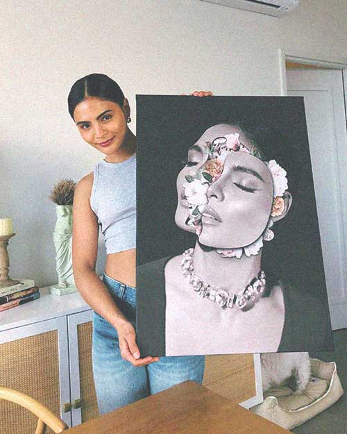 Actress Lovi Poe with a customized canvas print of What lies beneath art print