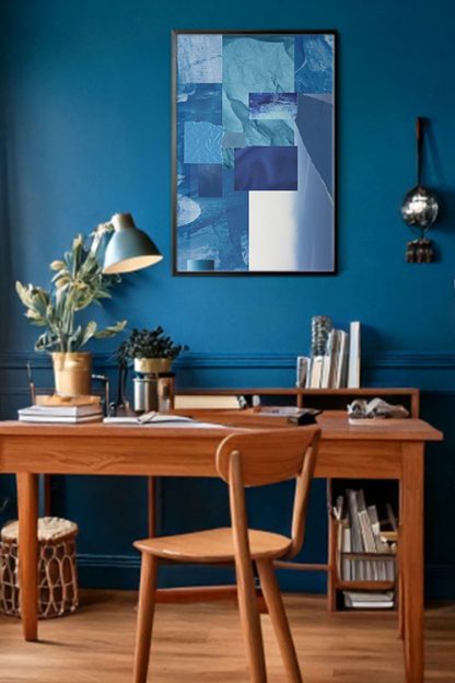 Fragment of Blue 2 Poster in a black frame on a blue wall on top wooden study table with books and lamps