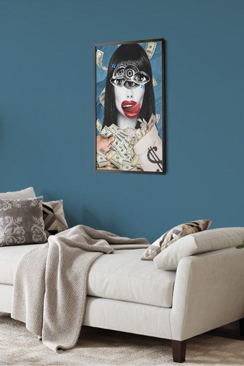 Gimme That Poster in a black frame with blue wall and gray cleopatra sofa