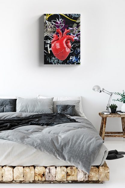 My Heart Speaks Canvas in a bedroom with a white wall and a big bed
