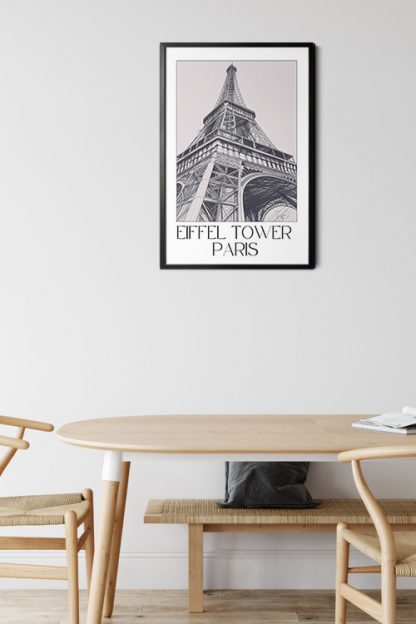 Eiffel Tower Paris Sketch Poster, black frame in a study room with a wood table and chairs with black