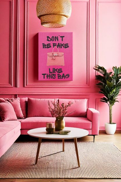 Don't Be Fake Canvas in the entertainment room with a pink sofa and plants on the side