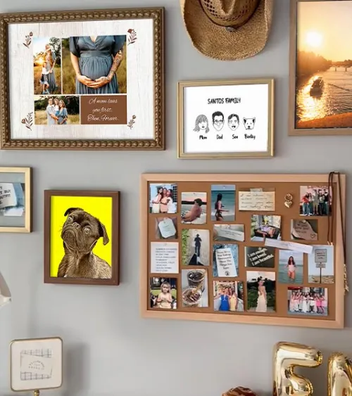 Different framed poster prints of personalized photos hanged on a wall.